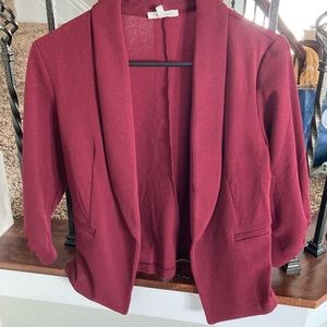 Maurice’s burgundy blazer. Size small.